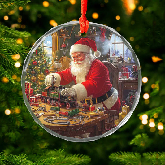 Netecom Santa Claus Perfecting Toy Train Glass Ornament – Master Toymaker Workshop Scene, Holiday Keepsake Gift, 3-inch
