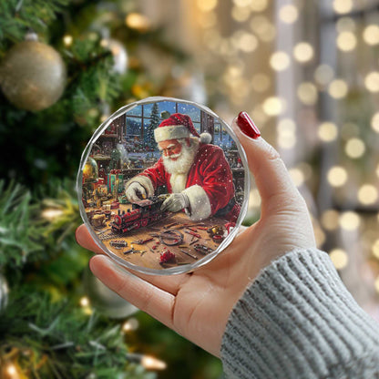 Netecom Santa Claus Making Toy Train Glass Ornament – Christmas Tree Decoration, Holiday Keepsake