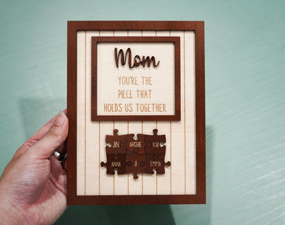 Netecom Personalized Mom Puzzle Wooden Frame Piece That Holds Us Together Sign Mother’s Day Gift for Mom Custom Family Name Keepsake